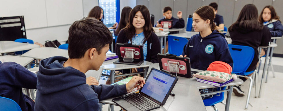 St. Ignatius students doing work on laptops